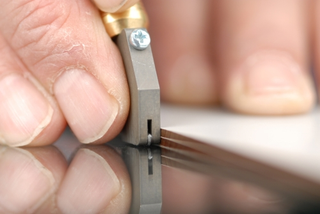 Illustration for article titled Glass Mosaic Tile Art - Mosaic Glass Cutters